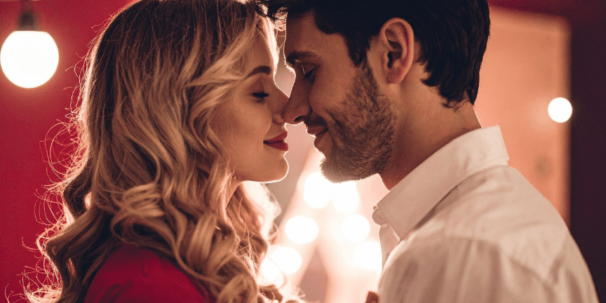 couple embracing for a kiss